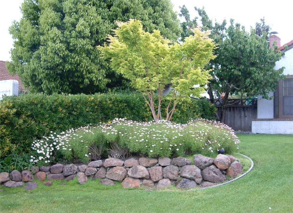 Stacked Rock Wall Raised Planter